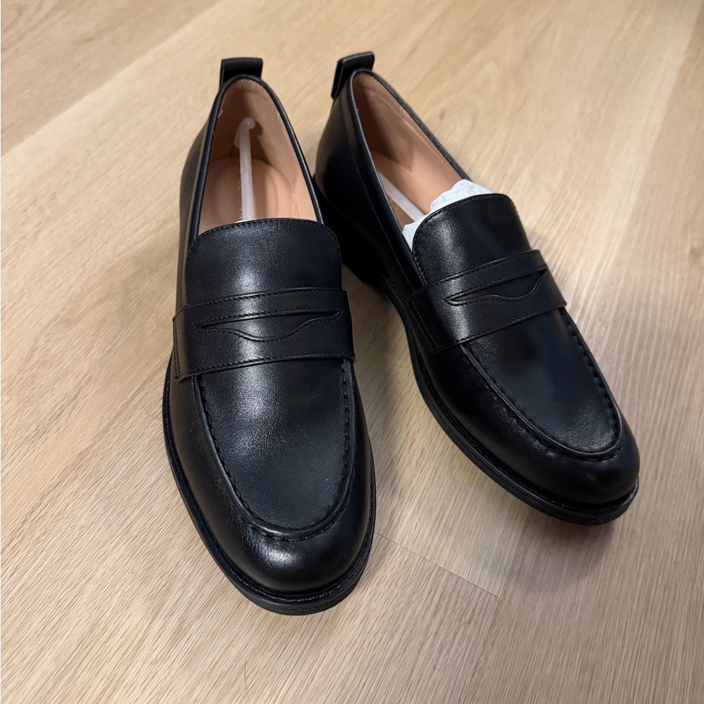 Cole Hann black leather loafers